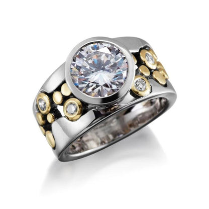 Anillo elegante con piedra tipo diamante y detalles brillantes – diseño dorado sofisticado